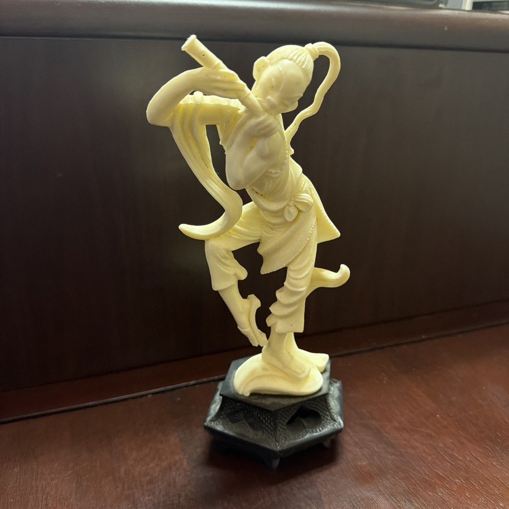 Chinese Figure Statue Playing Flute on Ornate Base. Faux Ivory. Ornate Stand